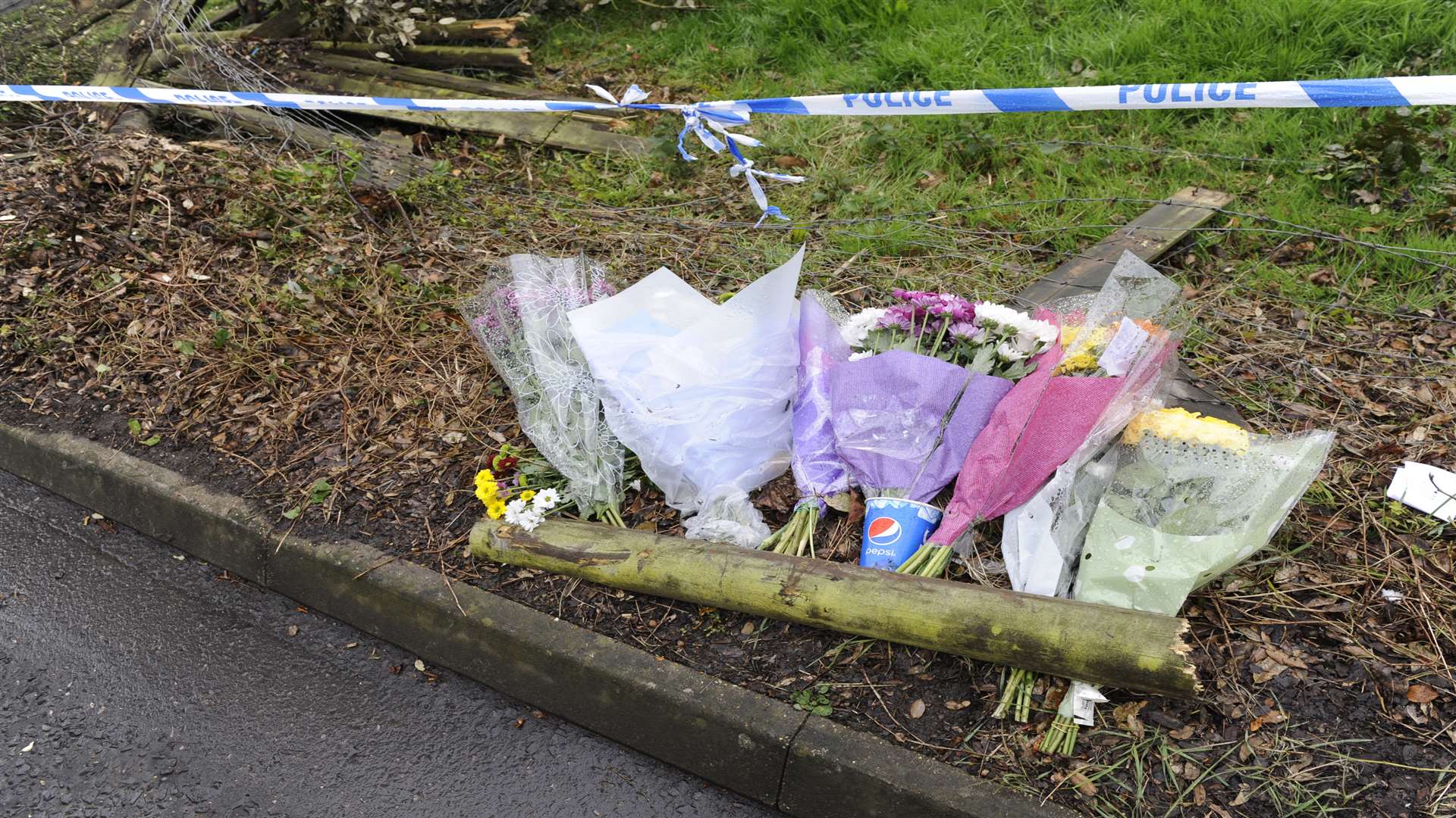 Tributes at the scene. Picture: Tony Flashman