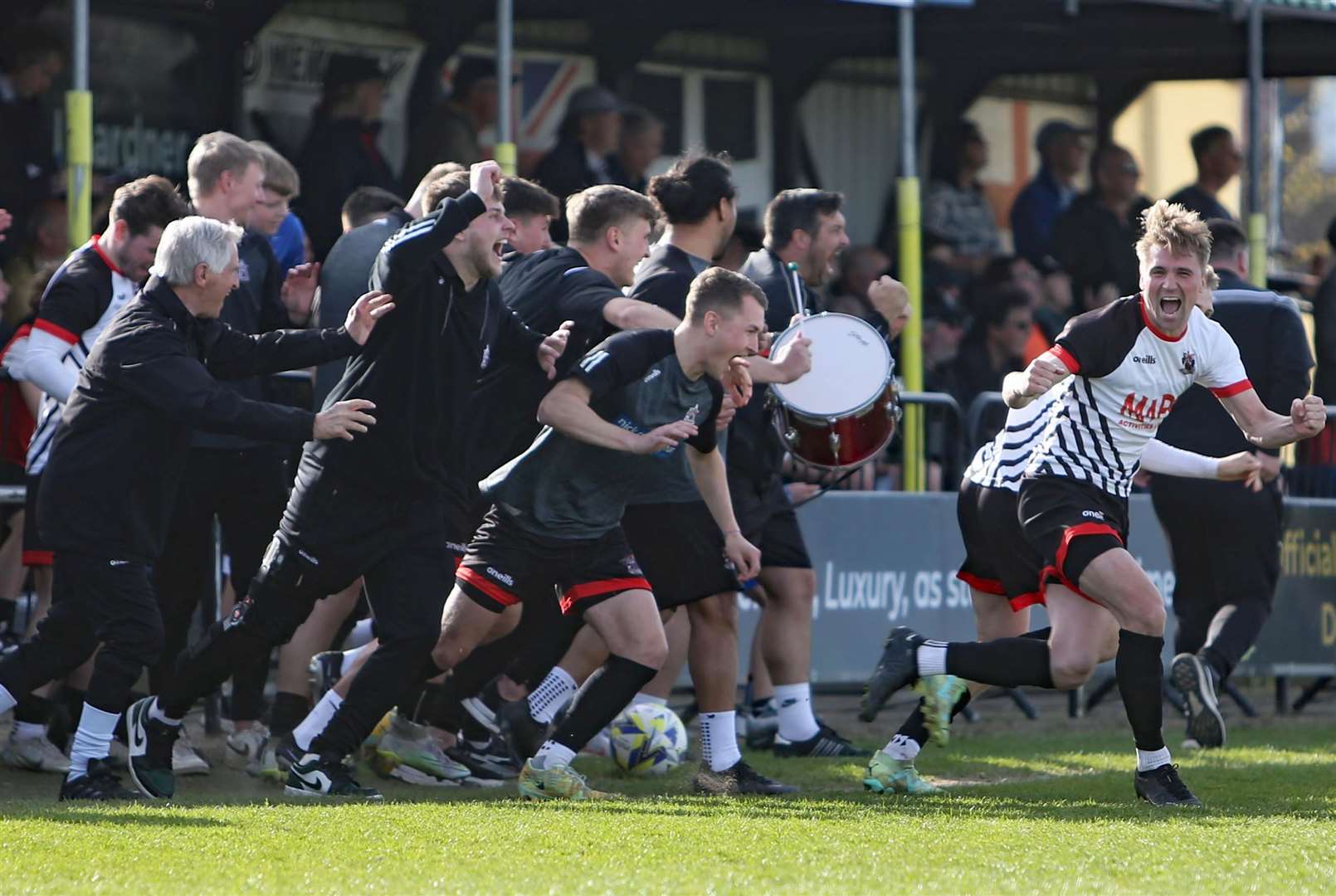 Champions Deal get their title-winning promotion party started at the full-time whistle of Saturday’s 3-1 home win against Lydd Town. Picture: Paul Willmott