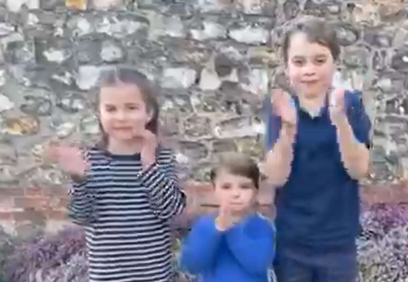 Princes George (right), Louis (centre) and Princess Charlotte joining in a national applause for the NHS (Kensington Palace/Twitter/PA)