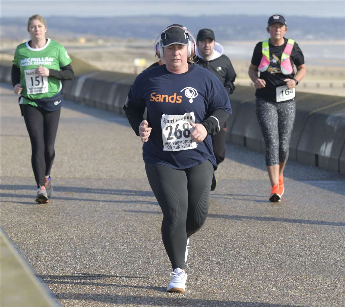 Nicola West (No.268) makes strides at Dymchurch, heading towards New Romney. Picture: Barry Goodwin