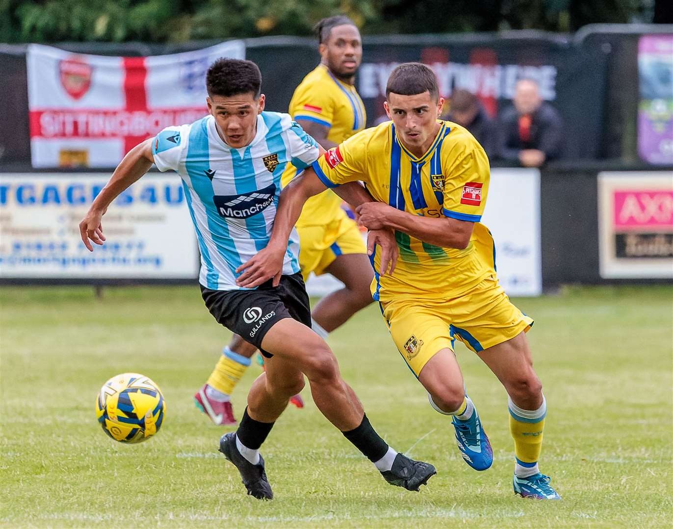 Sittingbourne (yellow) in action during their pre-season win over Maidstone last week Picture: Helen Cooper