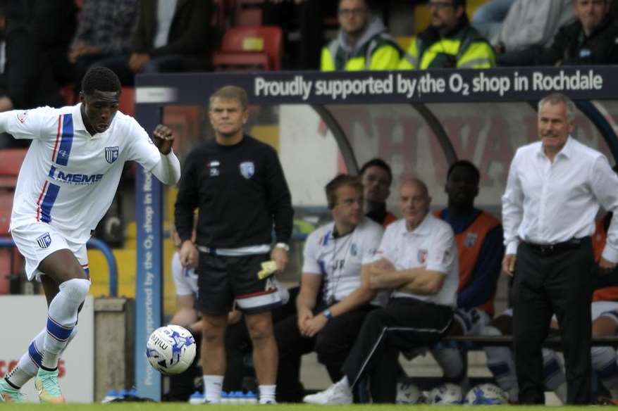 Peter Taylor watches on as Kortney Hause drives forwards at Spotlands on Saturday Picture: Barry Goodwin