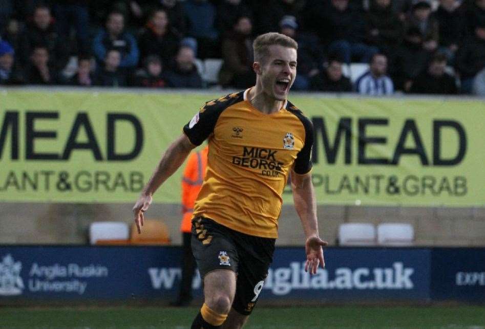 Former Cambridge striker Andrew Dallas scoring in League 2 against Colchester United Picture: Ben Phillips