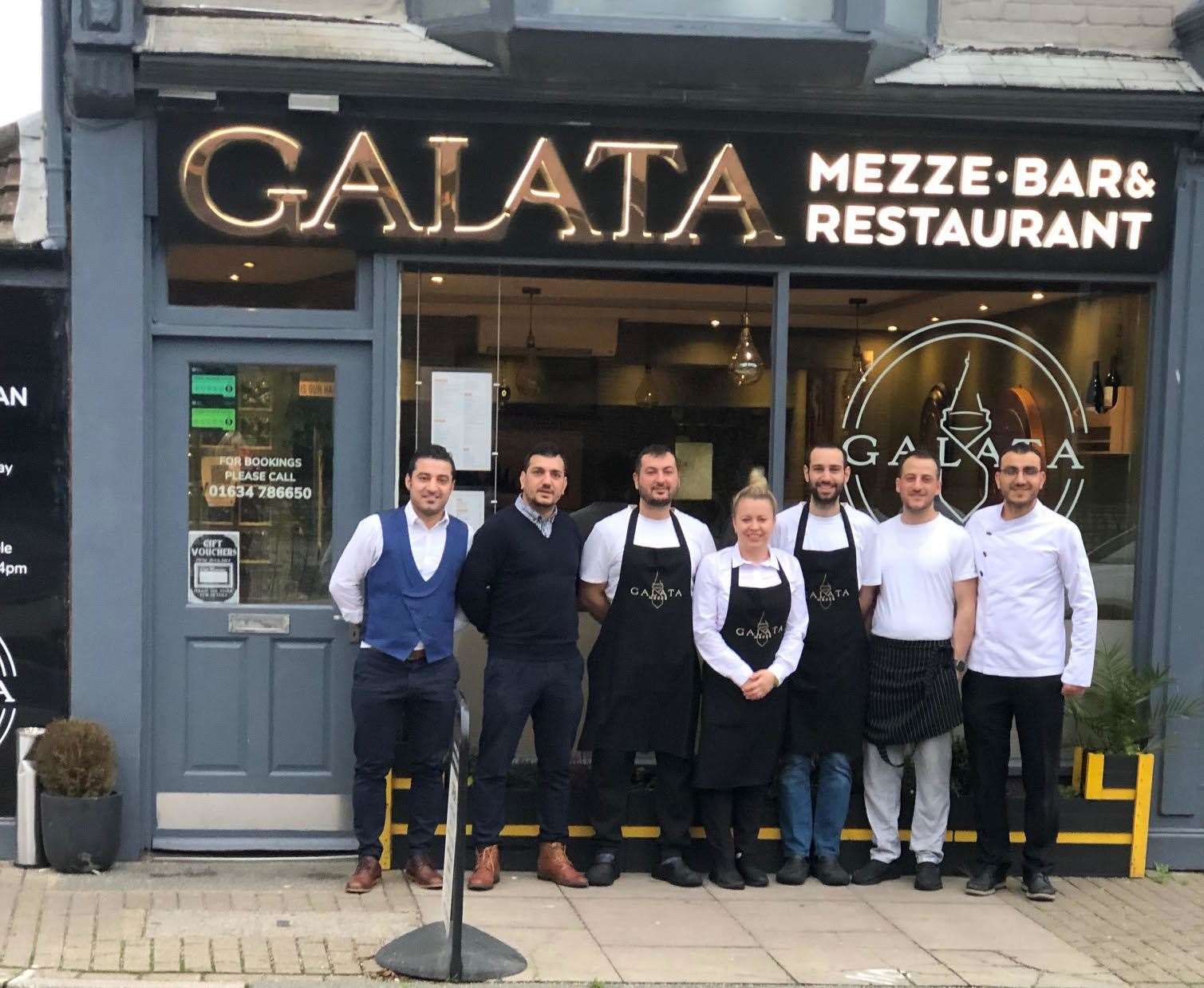 Staff outside Galata Mezze Bar & Restaurant in Rainham High Street