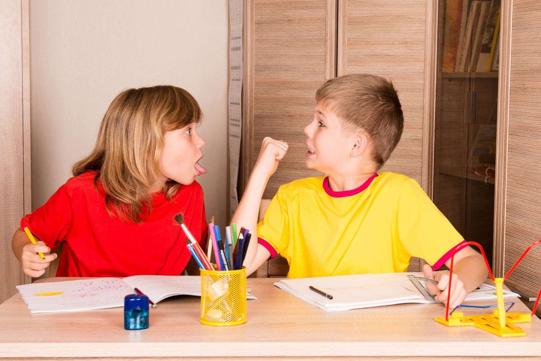 Would your siblings fight if left alone together? Stock photo.