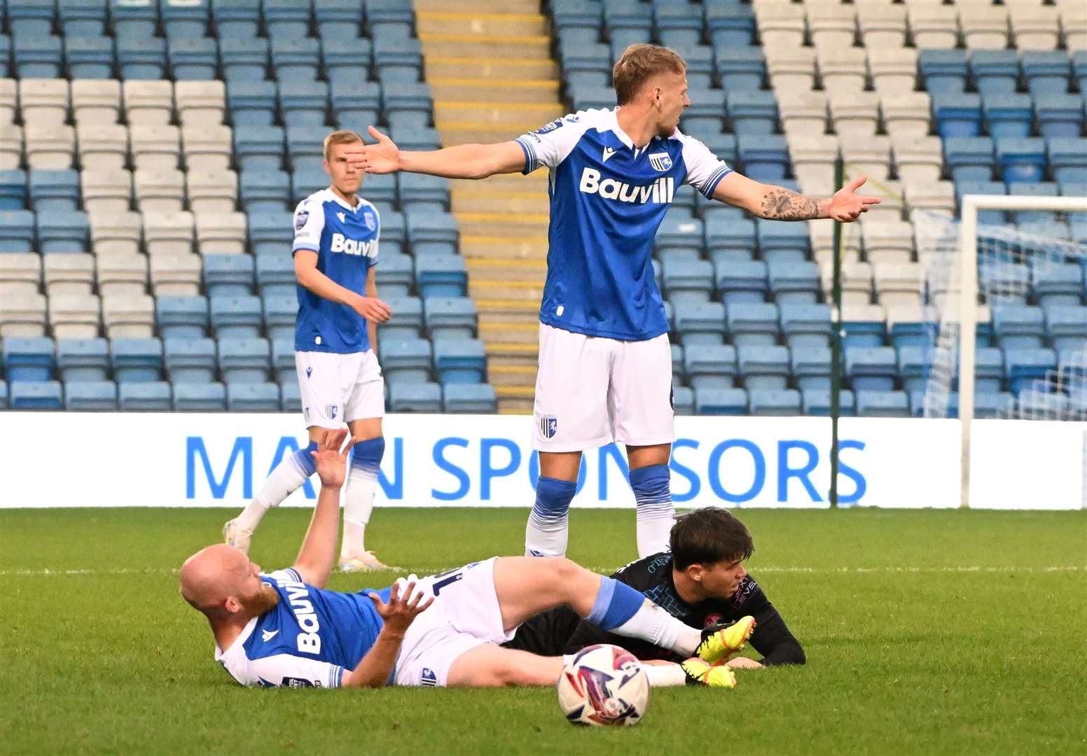 Jonny Williams is fouled in the opening half of Gillingham’s match with Peterborough Picture: Barry Goodwin