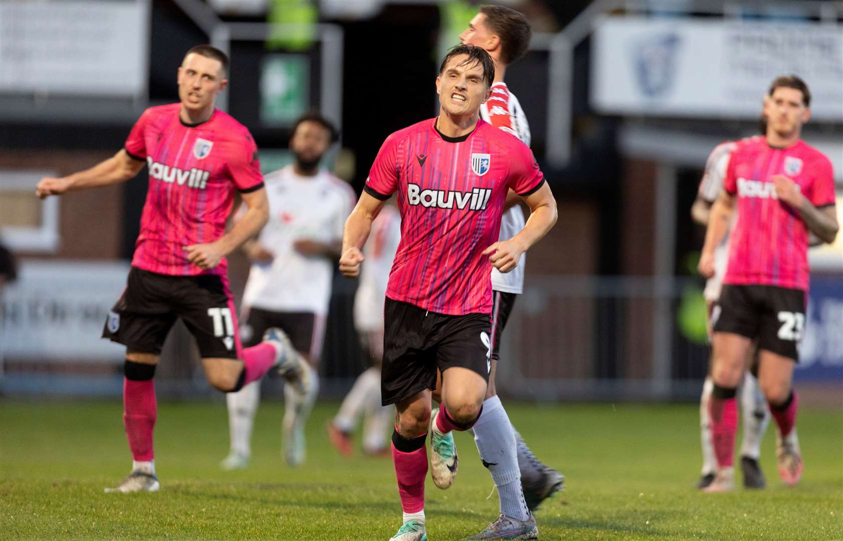 Striker Tom Nichols celebrates scoring their second goal at Hereford with a converted penalty Picture: @Julian_KPI