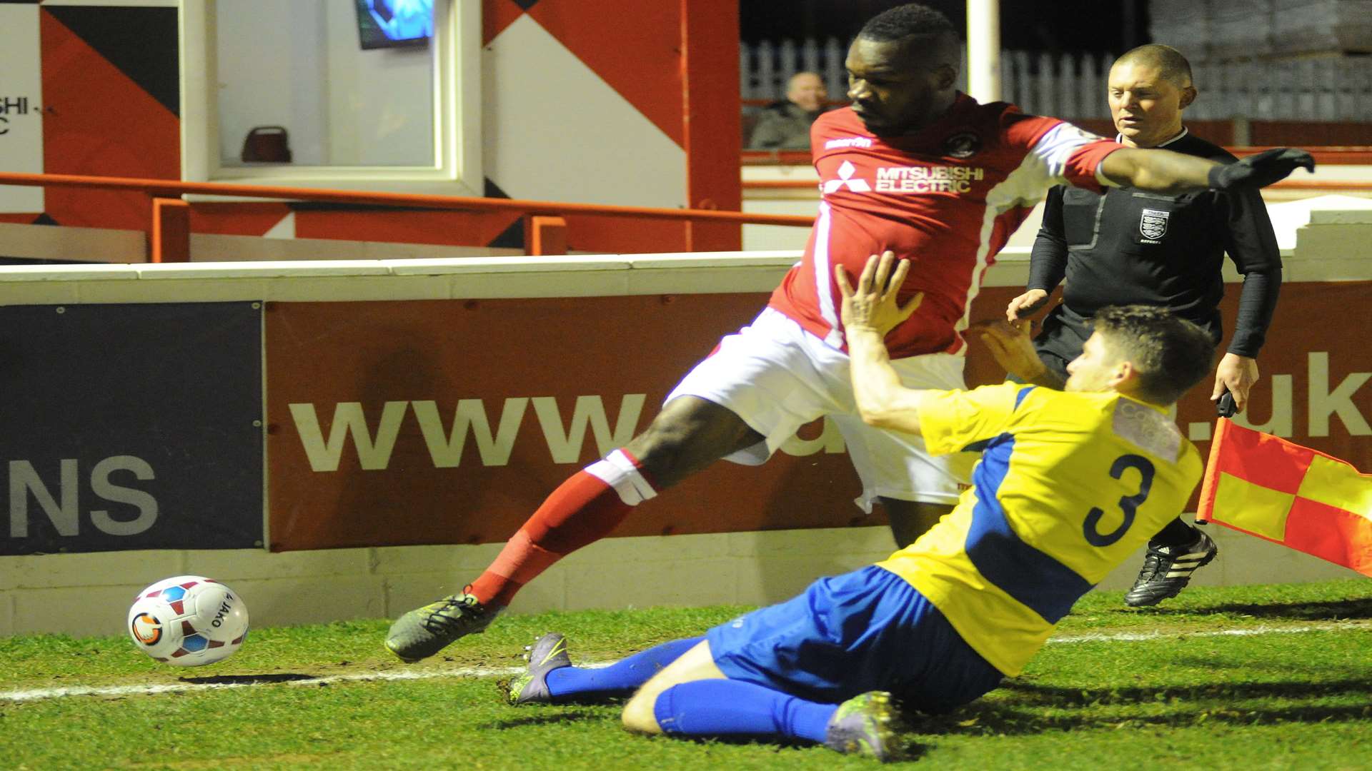 Ebbsfleet's matchwinner Aaron McLean is challenged by Lee Chappell Picture: Steve Crispe