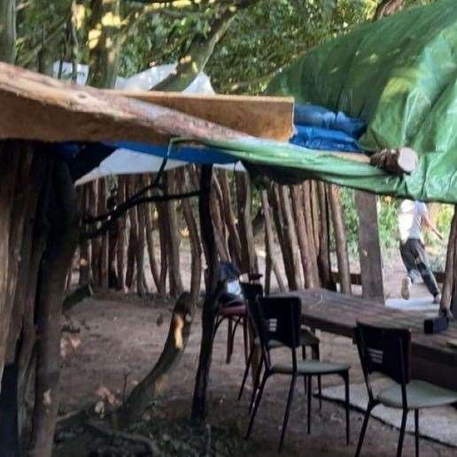 The treehouse created by the group of teenager had a tarpaulin roof, a front door and a viewing platform in Hermitage Lane woods, near Bartlett Way, Maidstone