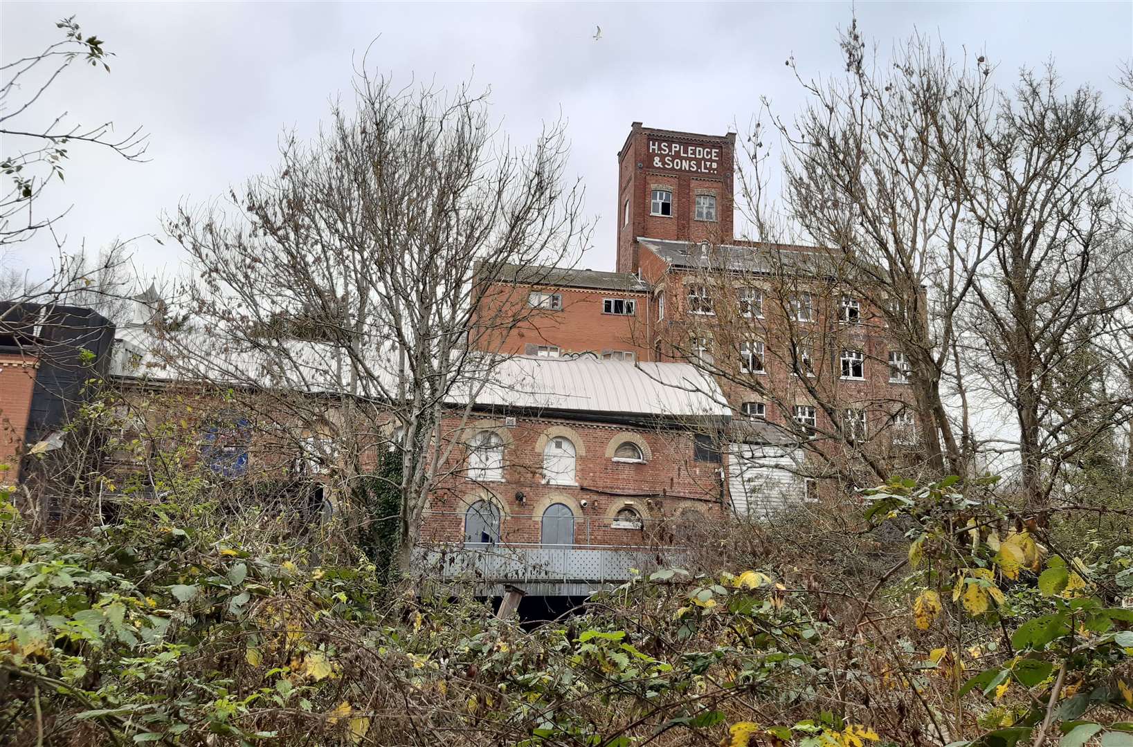 The riverside site is not a listed building