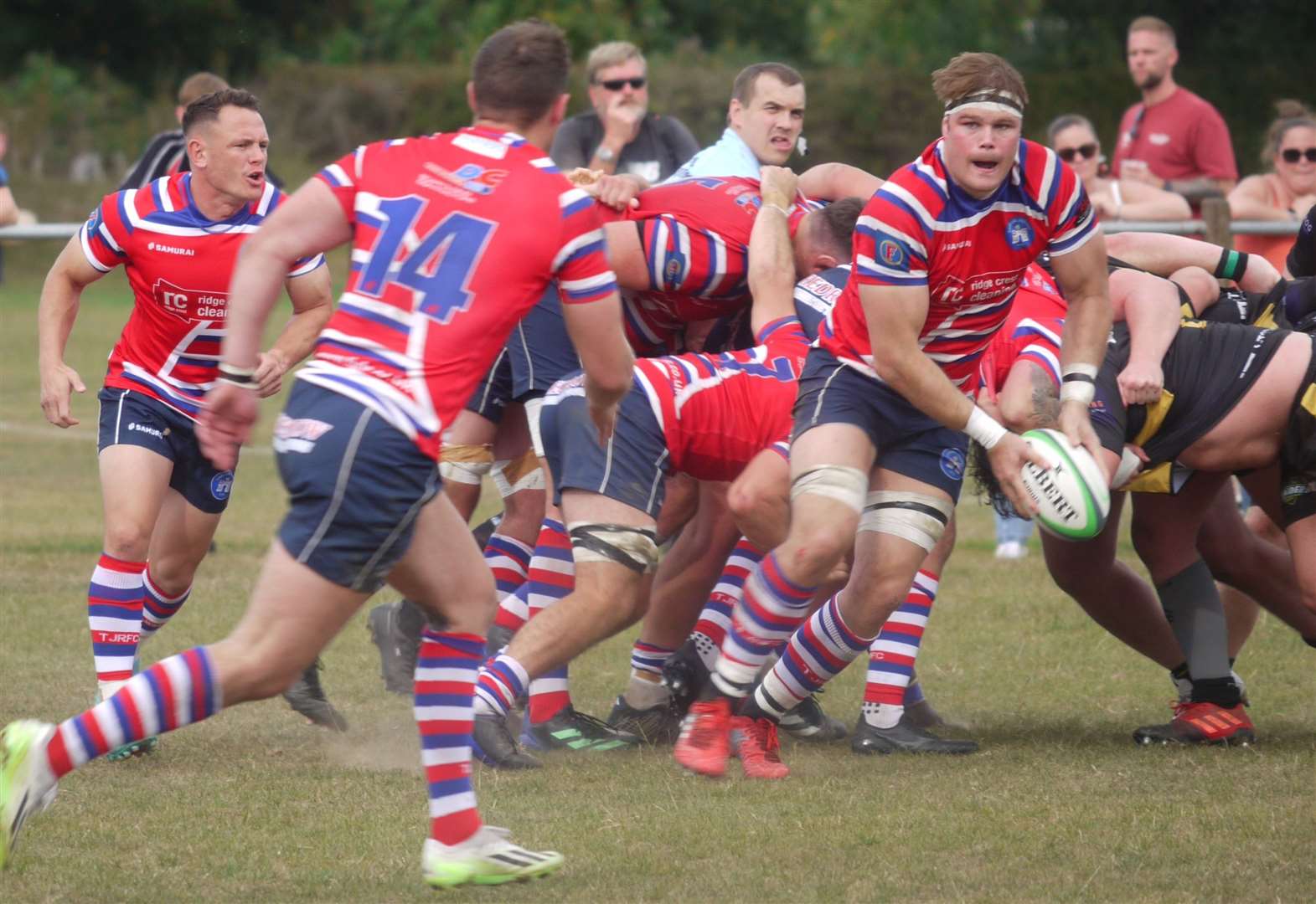 Tonbridge Juddians' Will Colderick feeds Jack Lucas against Guernsey. Picture: Adam Hookway