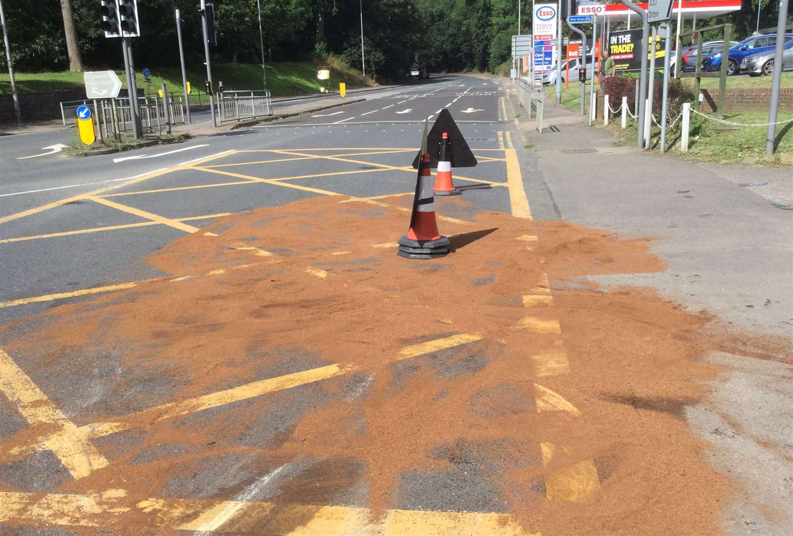 The clear up after the crash in Larkfield where oil was spilled