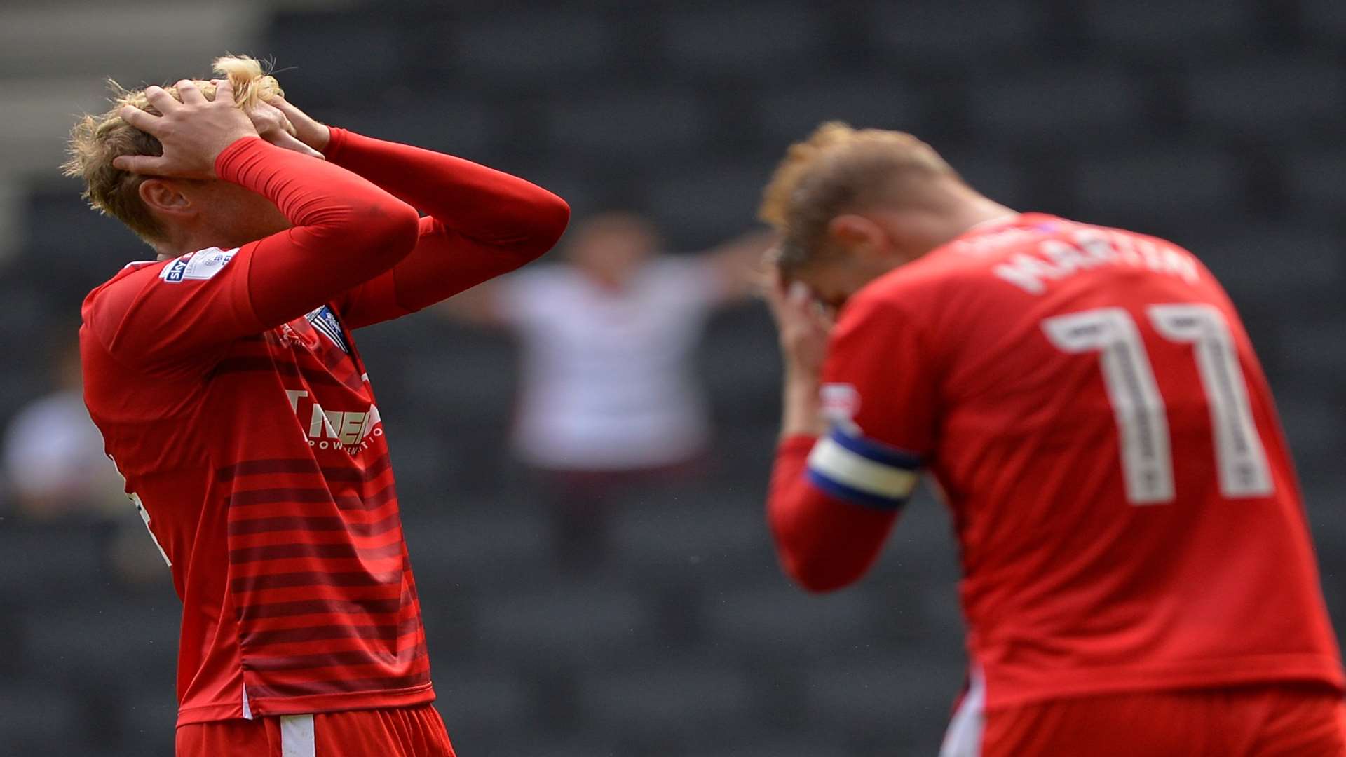 Josh Wright and captain Lee Martin reacts to the former's penalty miss. Picture: Ady Kerry