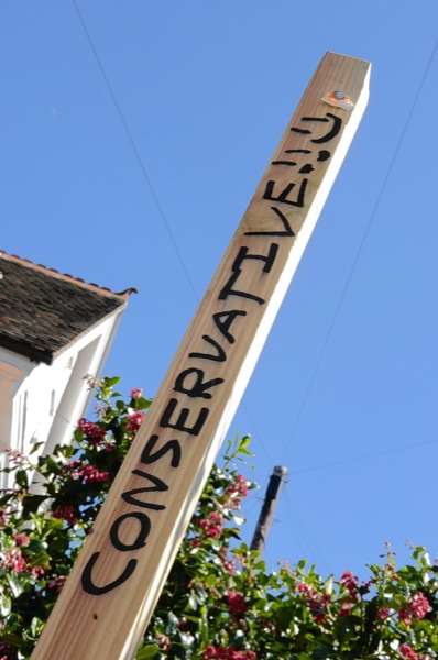 Vandalised Liberal Democrat sign in Saltwood