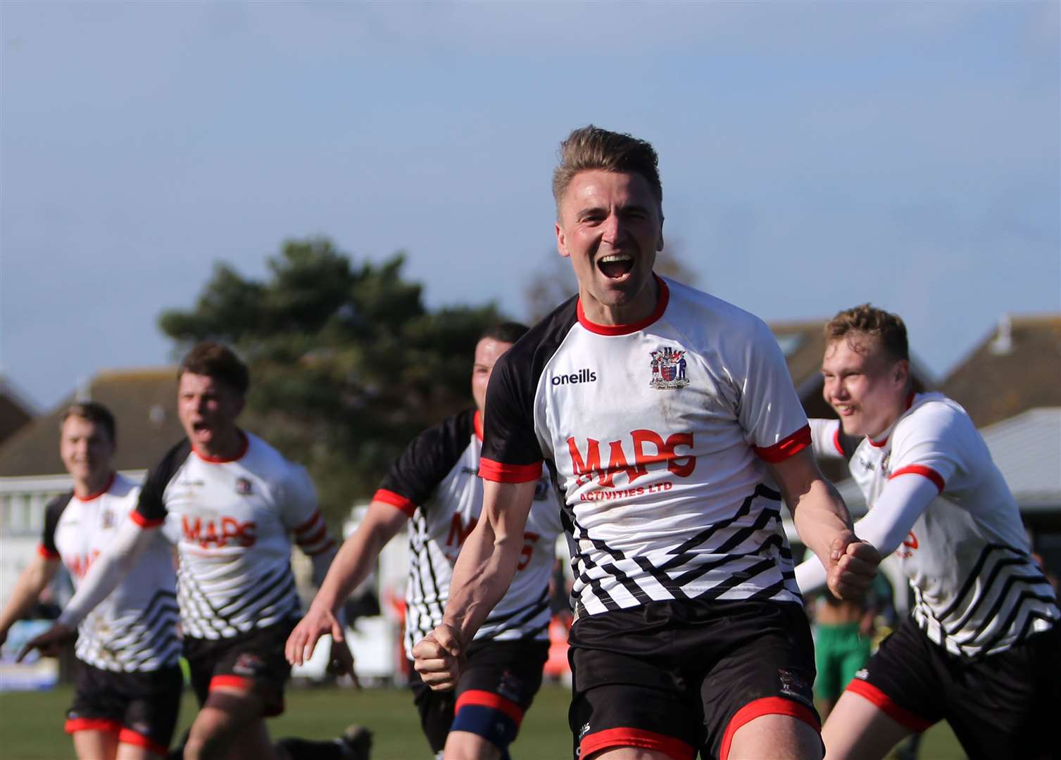 Tom Chapman leads Deal Town's celebrations. Picture: Paul Willmott