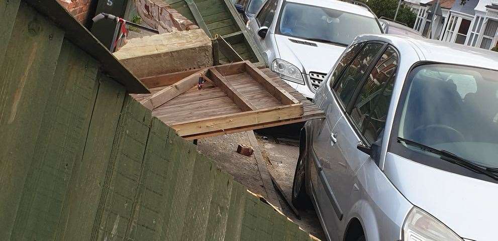 A car suffered damage through the unfortunate felling (42431379)