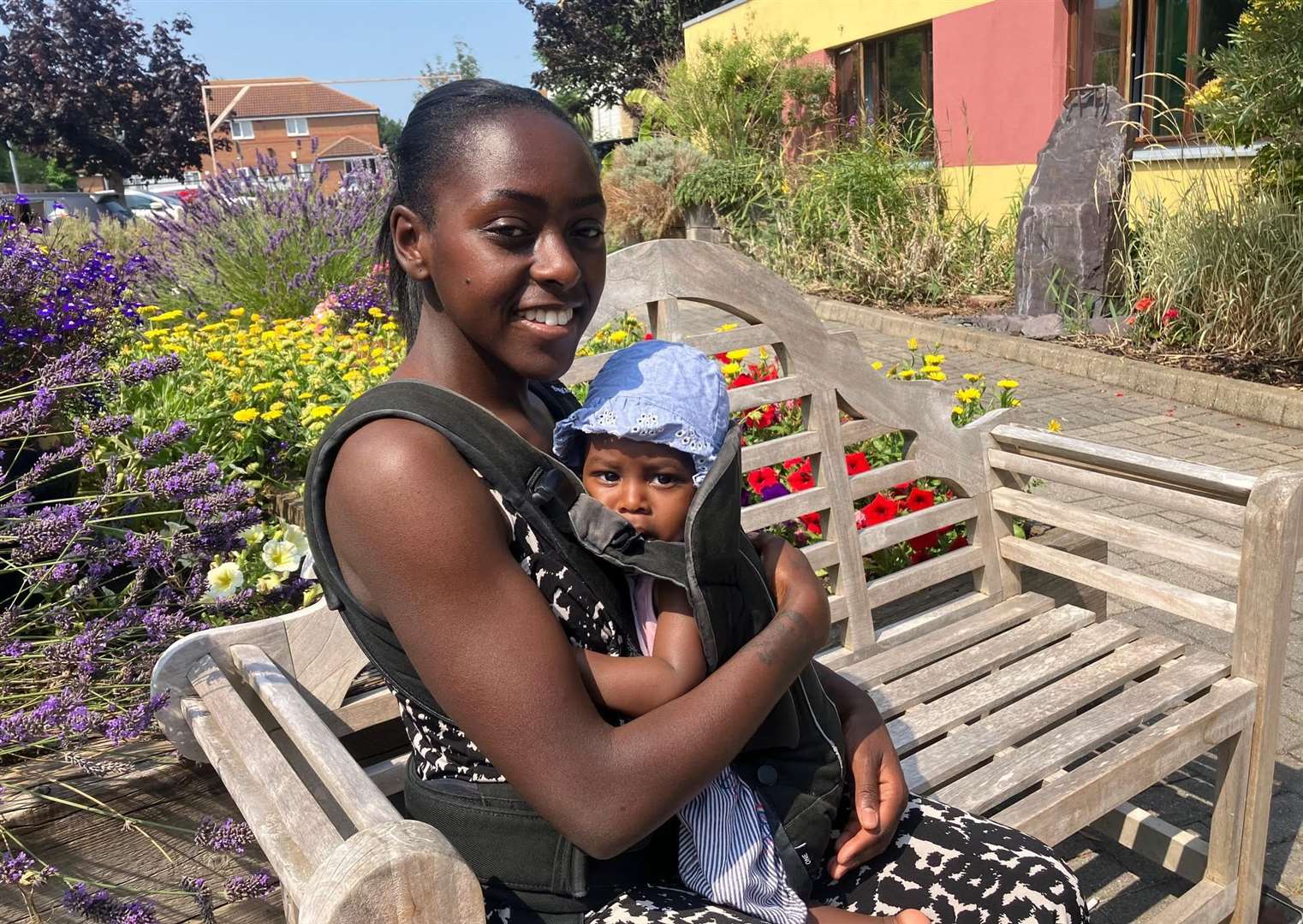 Seashells regular user Desire Cyprien and her baby Skyla outside the centre in the summer