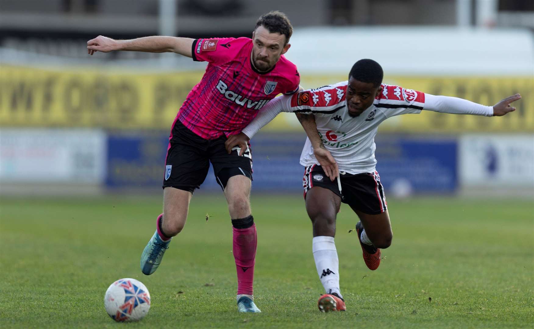 Scott Malone holds of a Hereford player as Gillingham win through in the FA Cup First Round Picture: @Julian_KPI