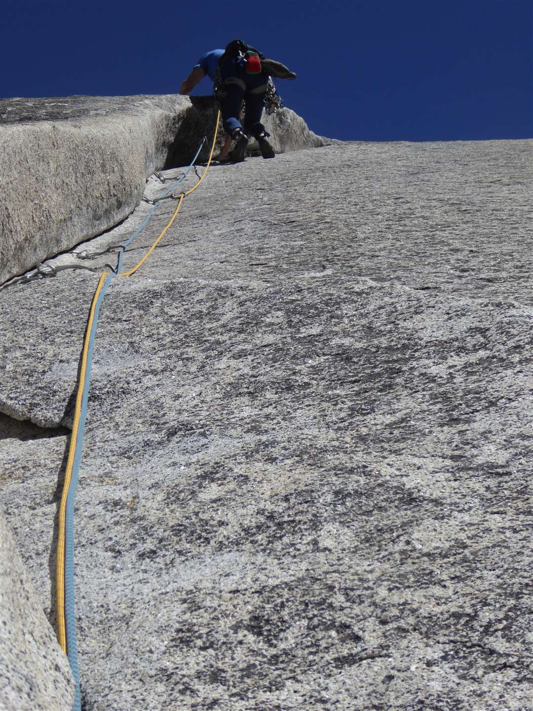 Jim Unwin climbing on the Stately Pleasure Dome, Tuolomne Meadows, California