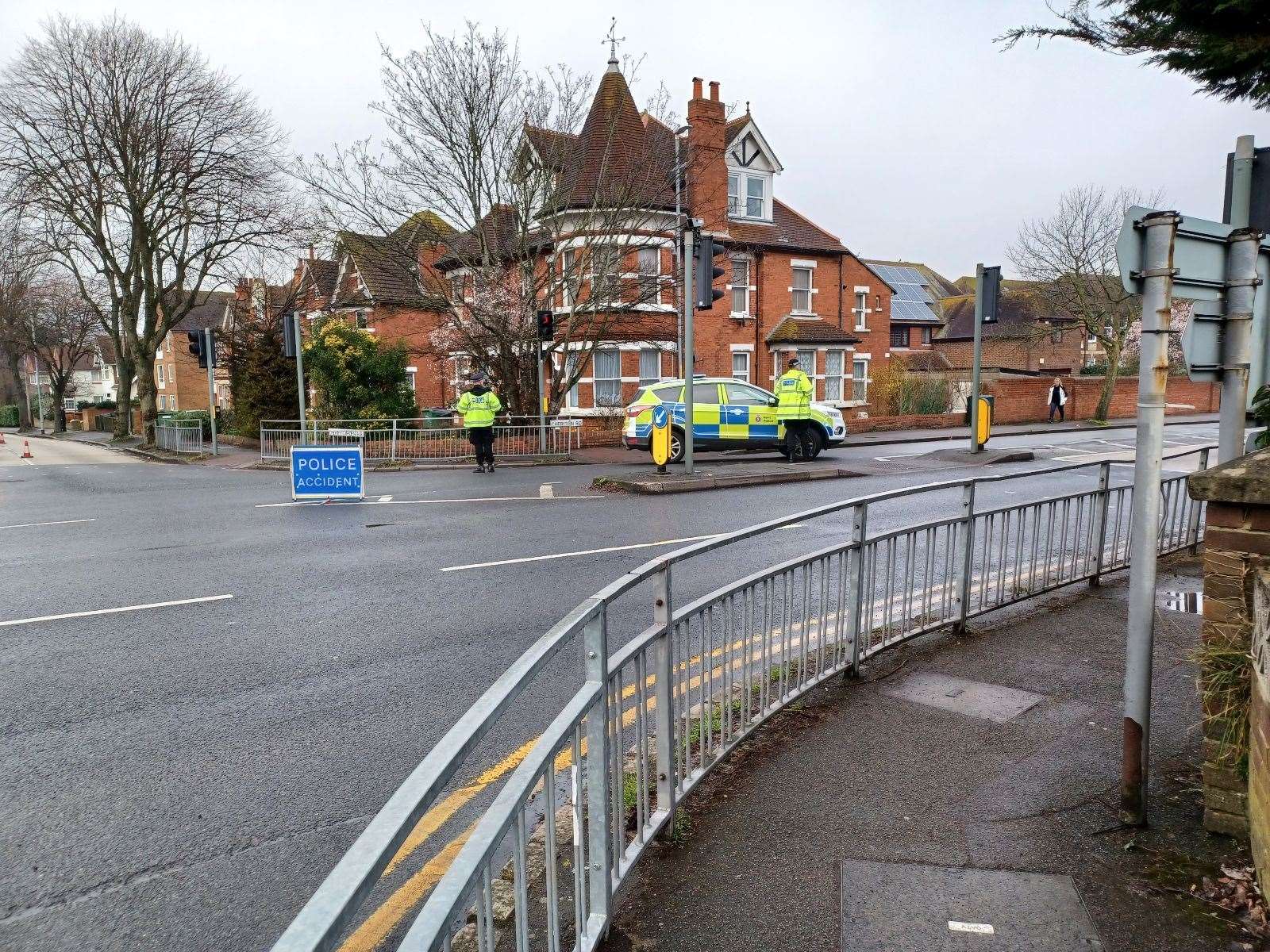 Police at the junction of Cherry Garden Avenue in Folkestone after the crash injured two women walking along Cheriton Road