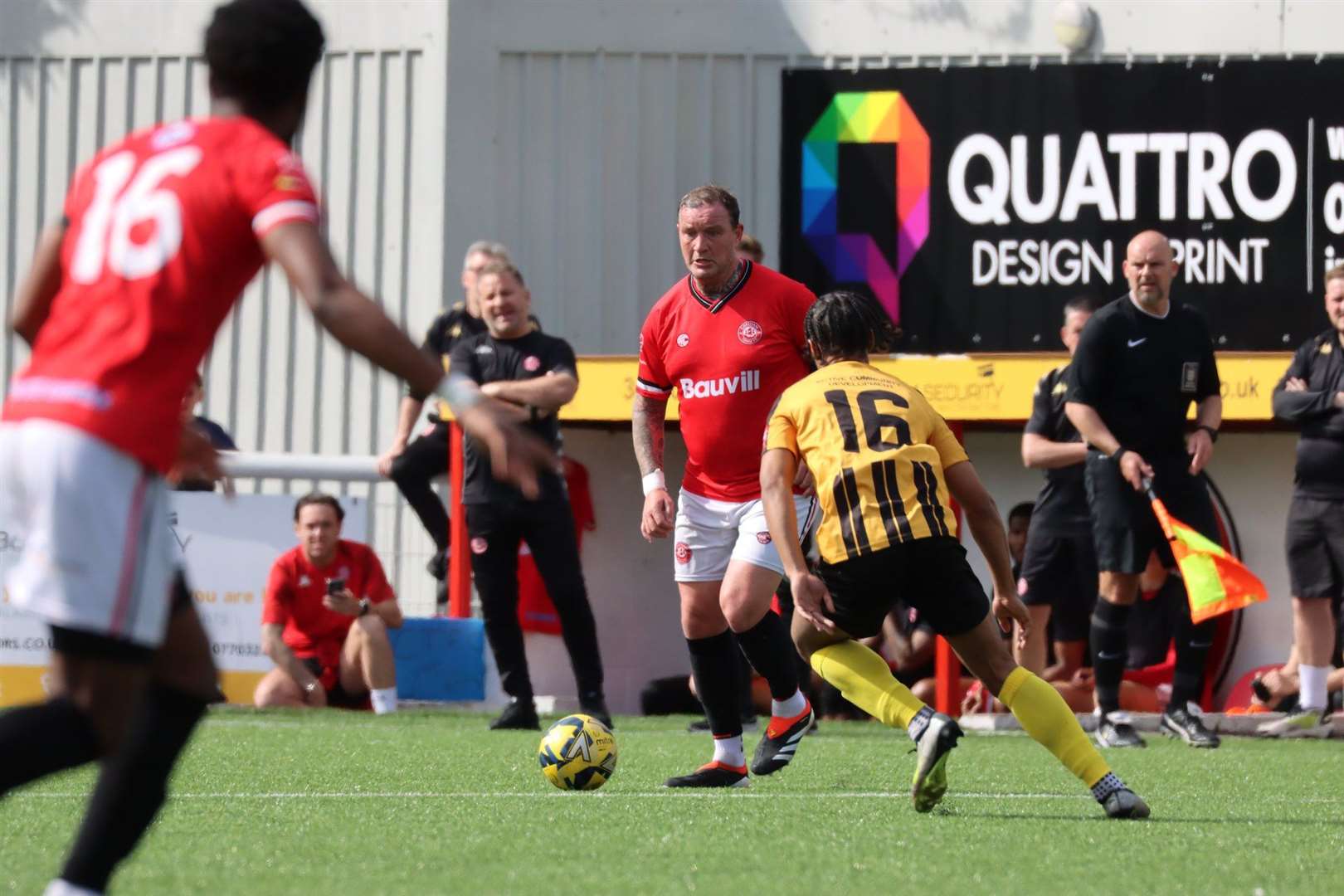 Player-assistant Danny Kedwell on the ball for Chatham as he prepares to take on Folkestone's Jordan Ababio Picture: Max English (@max_ePhotos)