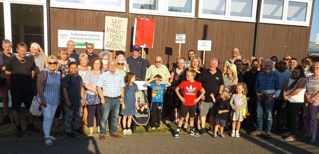 Market supporters protest before the public meeting on July 29. Photo: Julie Wassmer