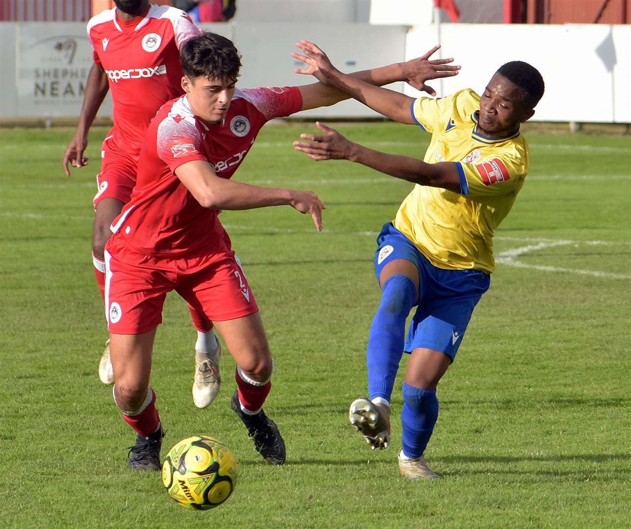 Hythe defender Louie Procopi battles for possession against Eastbourne. Picture: Randolph File