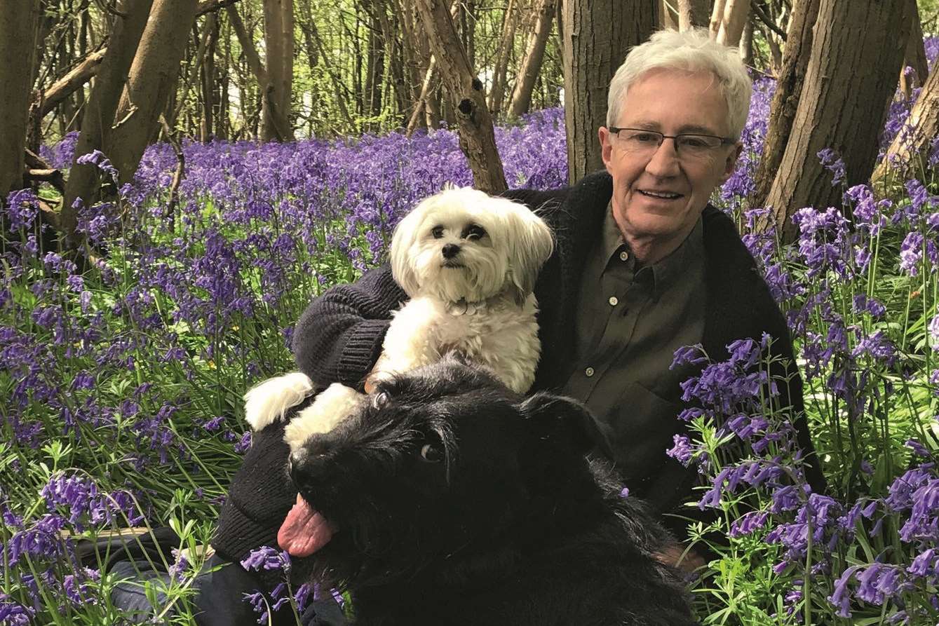 Paul with his dogs Picture: Andre Portasio/PA