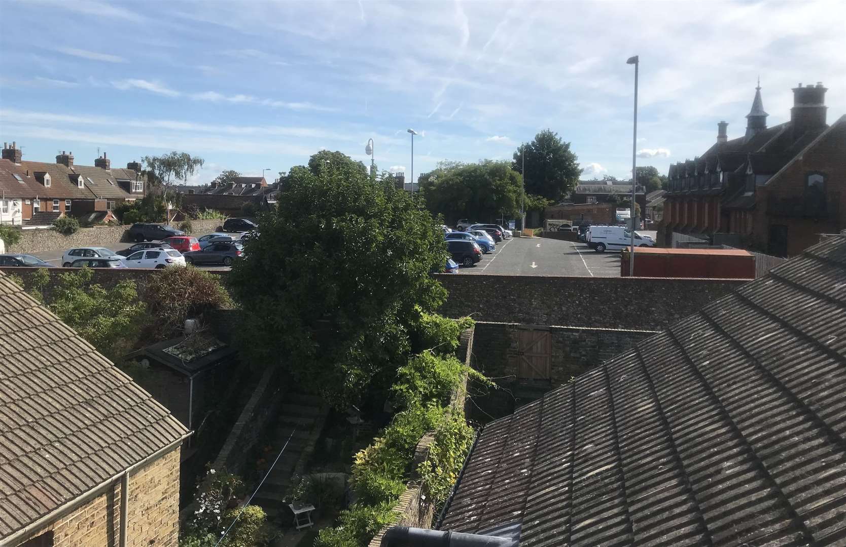 The view of Queens Hall car park from a Roman Road house