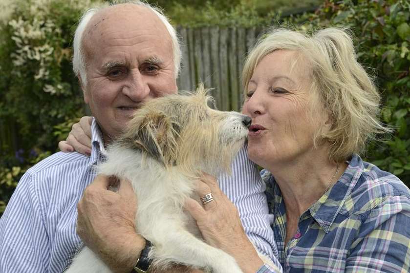 Mike and Chrissie Garner with Buster, who spent the night down a rabbit hole