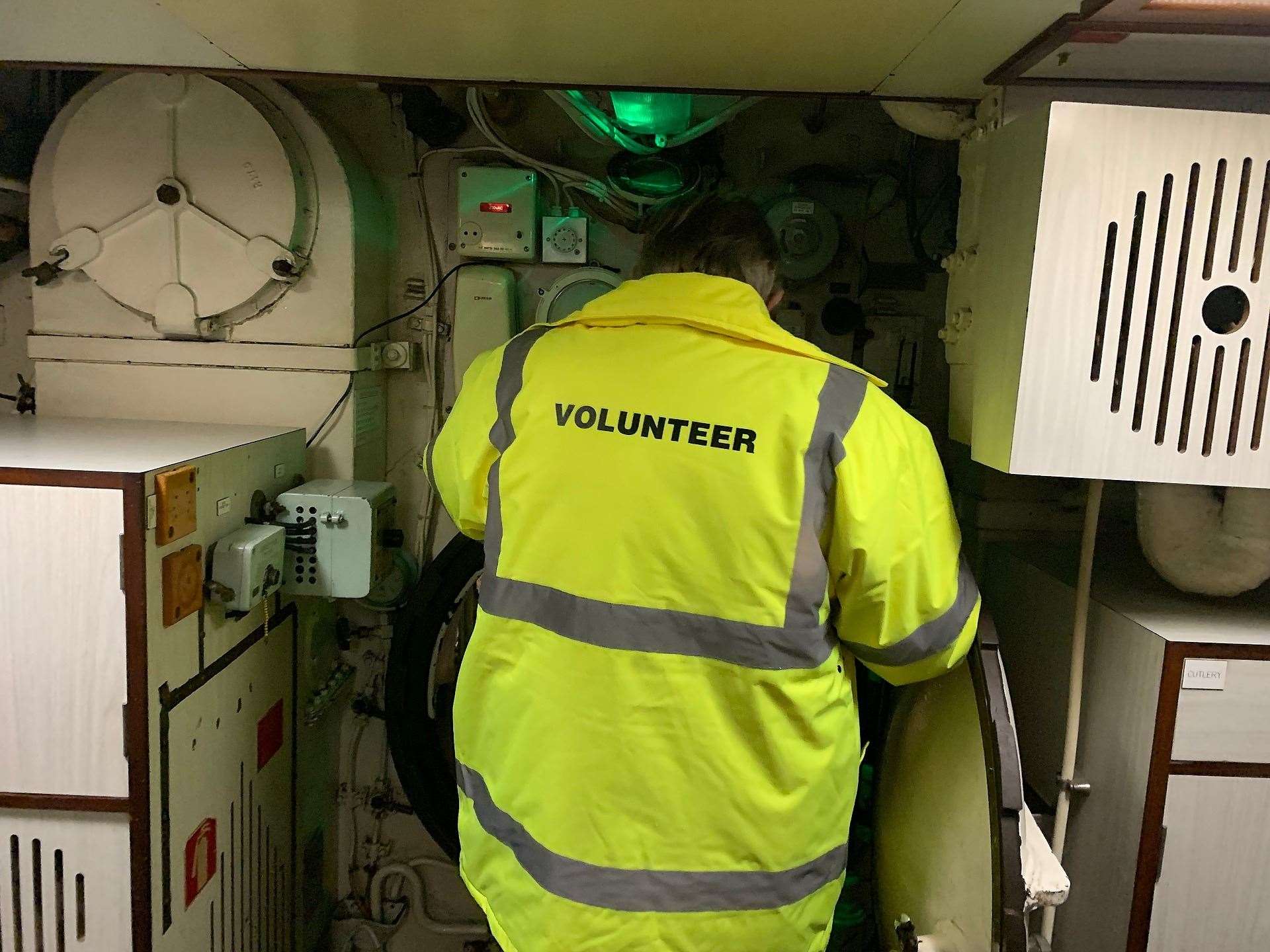 A volunteer working on board to get Ocelot ready for her birthday celebrations