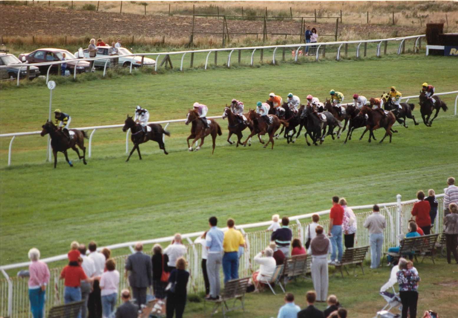 Racegoers enjoy the sunshine and excitement at the KM/Radio Kent race day staged at Folkestone Racecourse in 1991