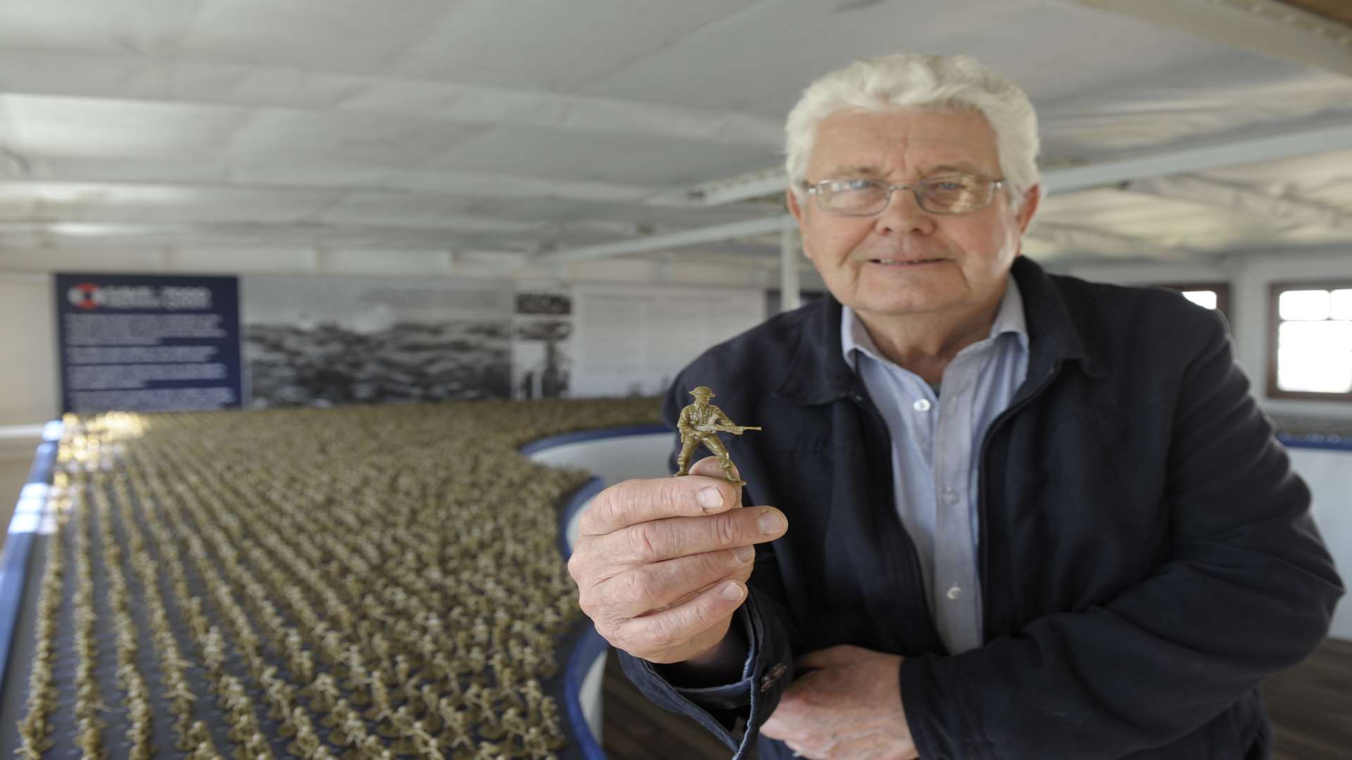 Brian Burton, Chairman of Medway Queen Preservation Society, with the soldiers. Picture: Steve Crispe