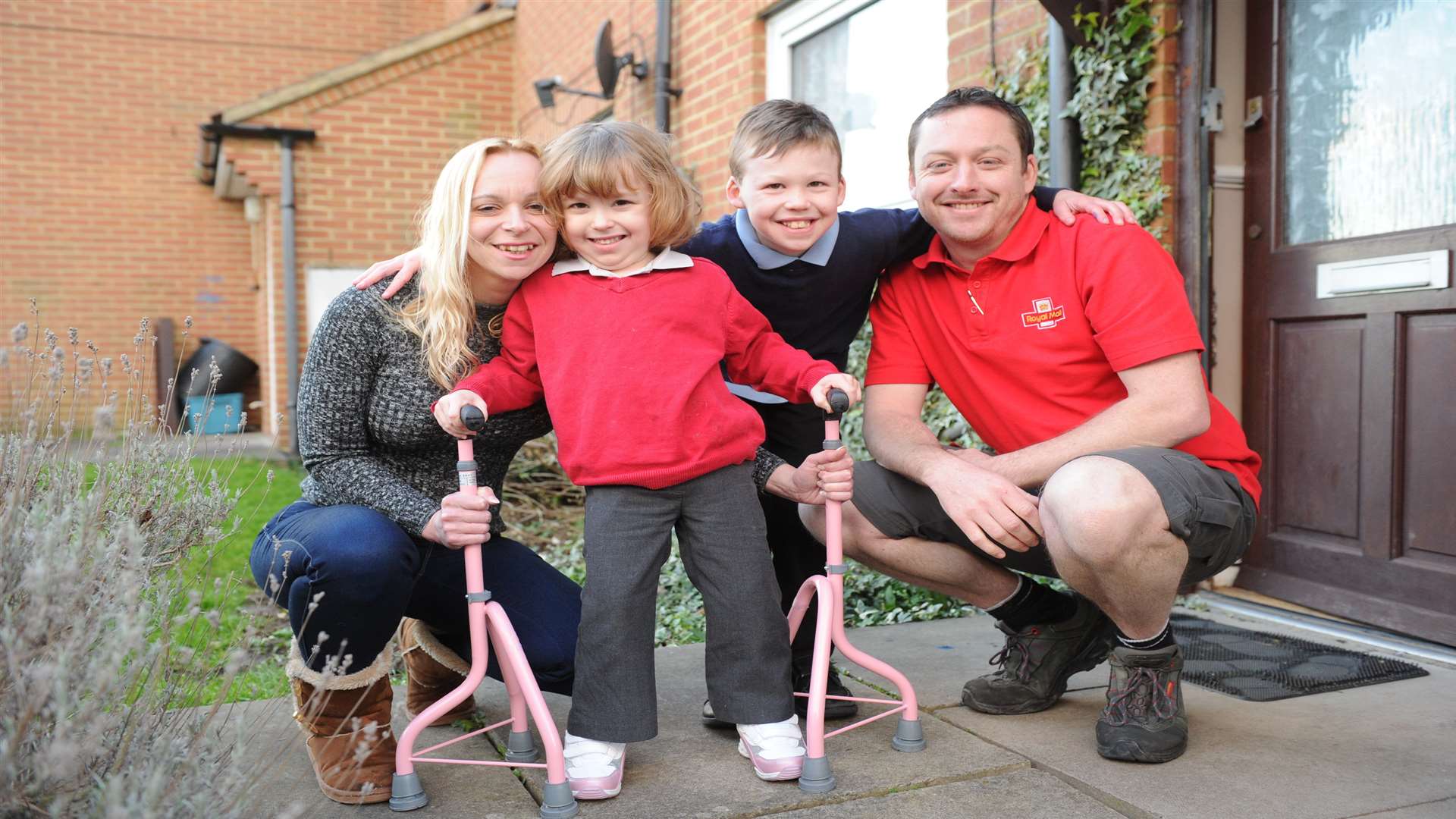 Paige Stewart with parents Julie and David and brother Craig