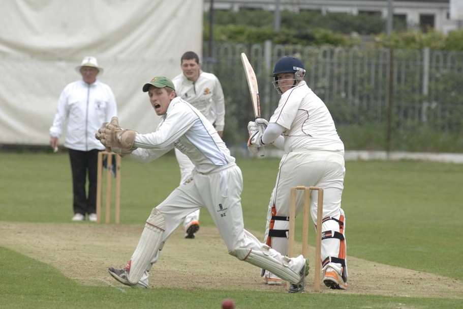 Sibton Park's Ben Allon watches as the ball evades Whitstable's keeper Buz Gould at The Belmont Ground. Picture: Chris Davey