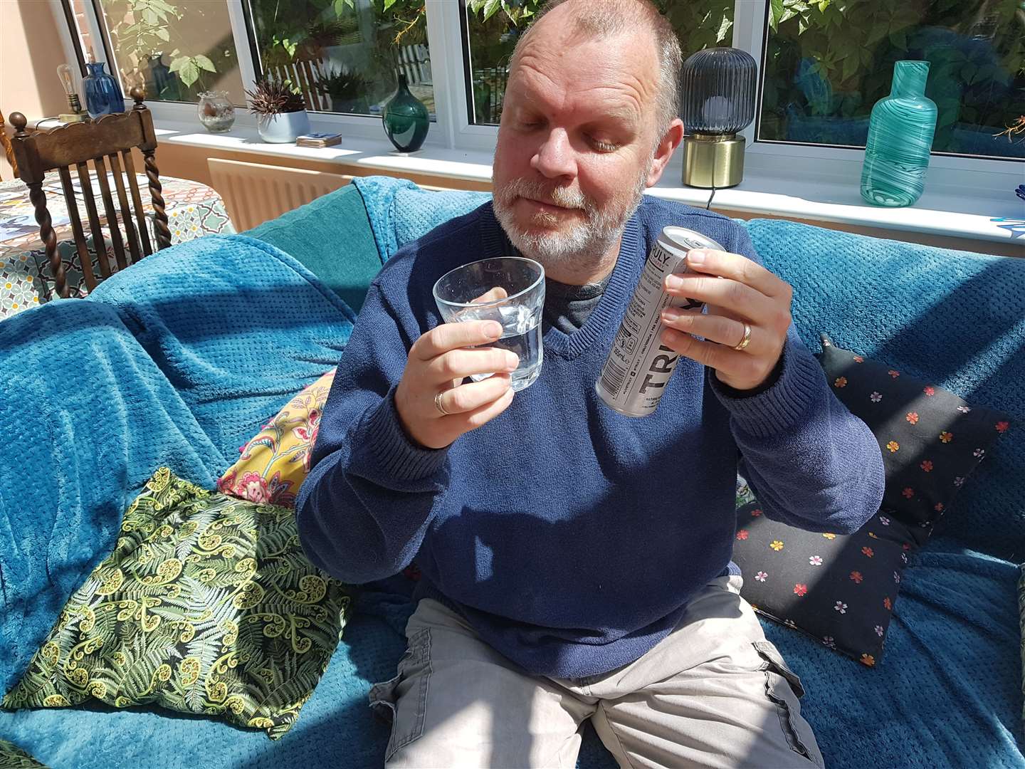 This is the look of a man pleasantly surprised at the new alcoholic water craze