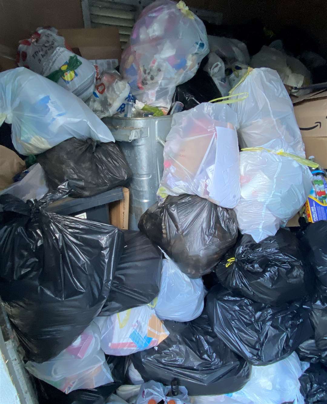 After four weeks, the bin store at Hayle Mill in Tovil was overflowing with waste