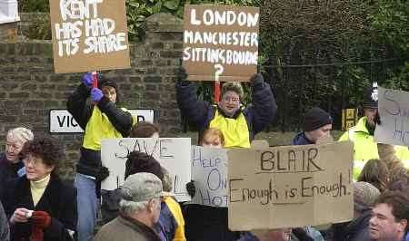 CLEAR MESSAGES: the protestors marching through the town centre. Picture: BARRY CRAYFORD