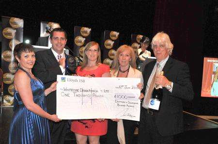 Keith and Anne Wisdom, with Alex Hill, right, after Whitecode Design Associates, Dartford, was named Dartford and Gravesham Business of the Year in the 2010 Dartford and Gravesham Business Awards at the Woodville Halls, Gravesend