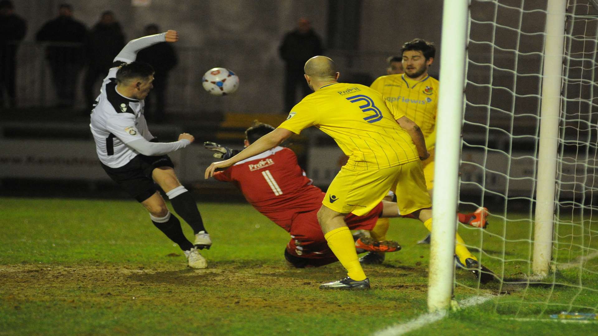 Wealdstone keeper Joe Taylor saves a close-range shot from Andy Pugh Picture: Steve Crispe