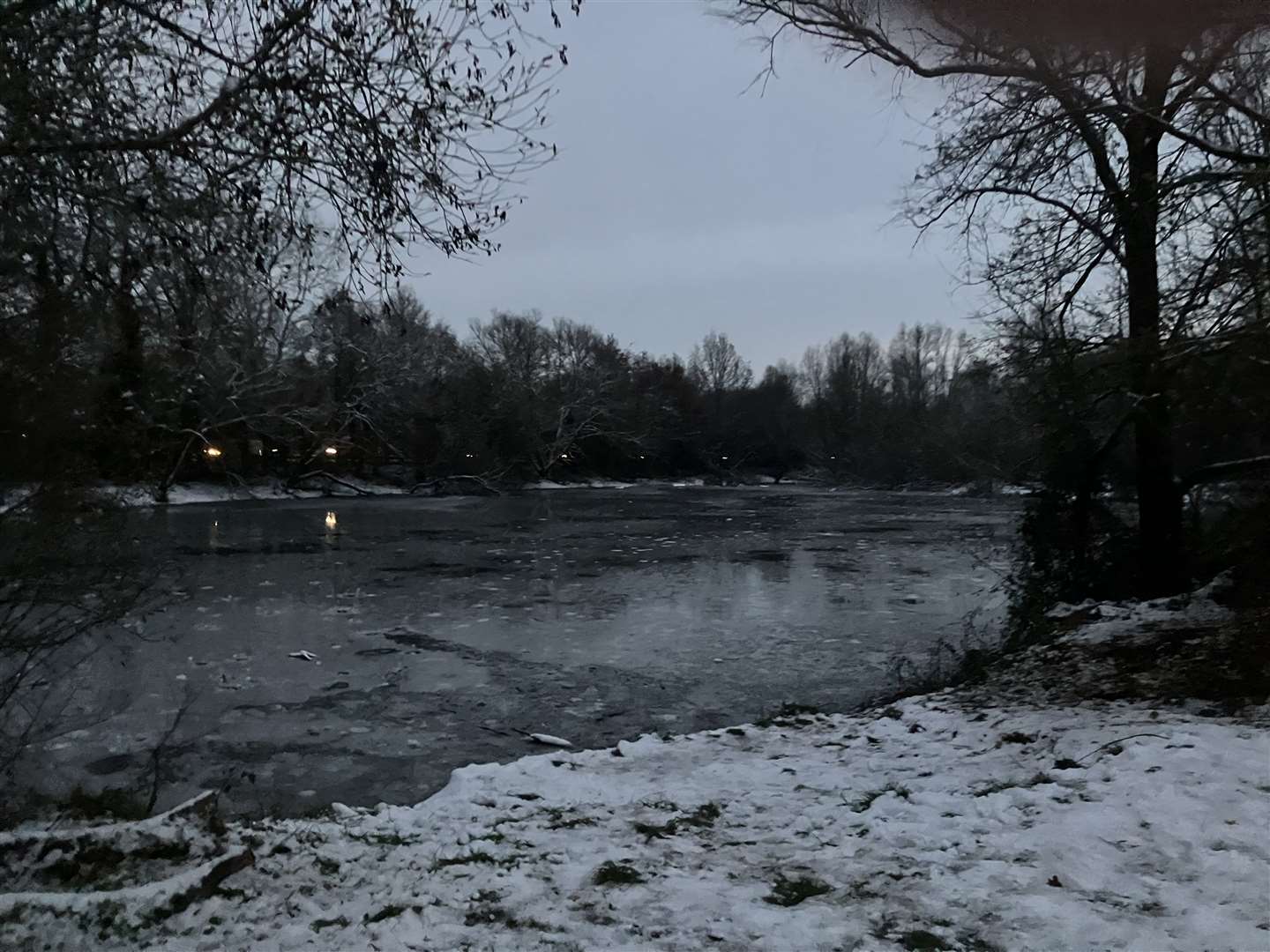 A coastguard helicopter was seen circling a lake in Nevill Park, Snodland