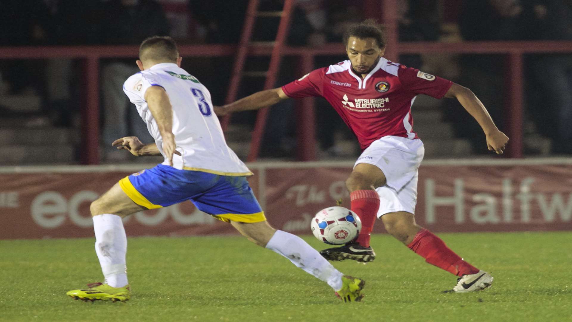 Brendan Kiernan plays the ball forward against Farnborough Picture: Andy Payton