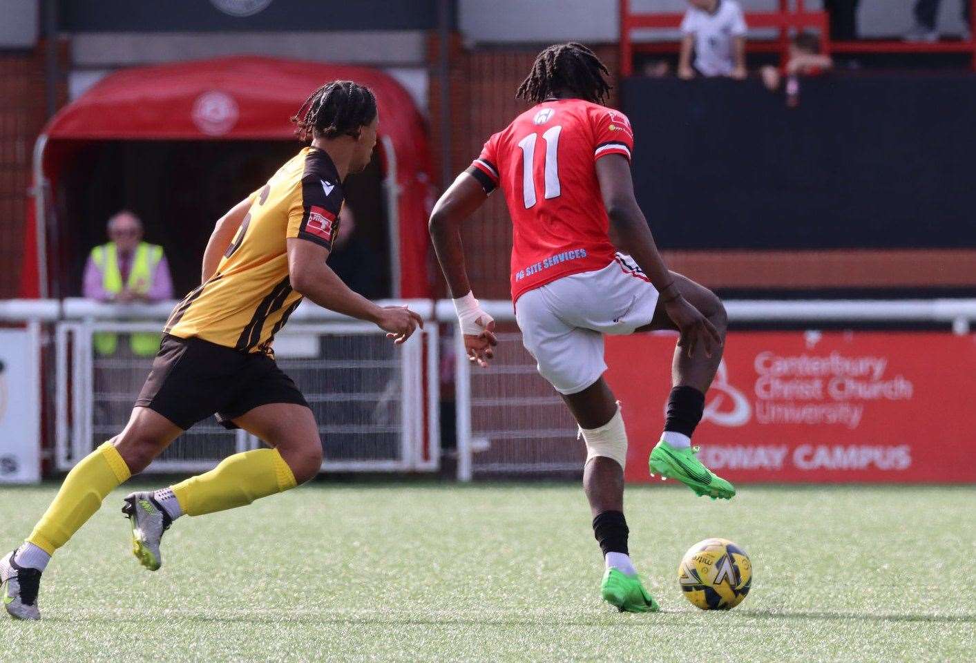 Jamie Yila, of Chatham, is closed down by Folkestone's Jordan Ababio in midfield during Chats’ 2-0 Isthmian Premier derby win on Saturday. Picture: Max English (@max_ePhotos)