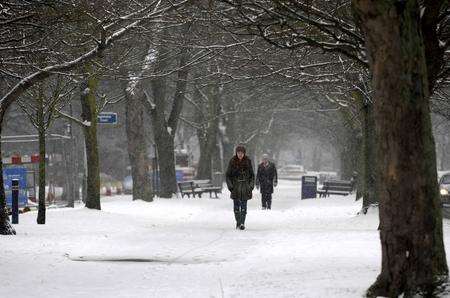 Walkers in the Folkestone snow.