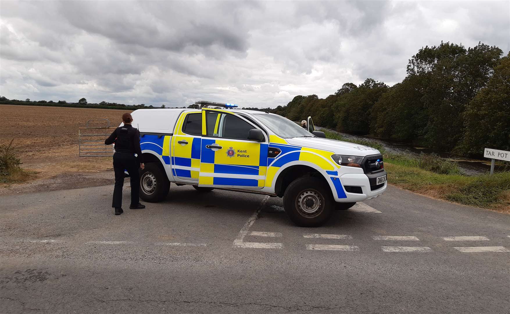 Police in Tar Pot Lane next to the Royal Military Canal