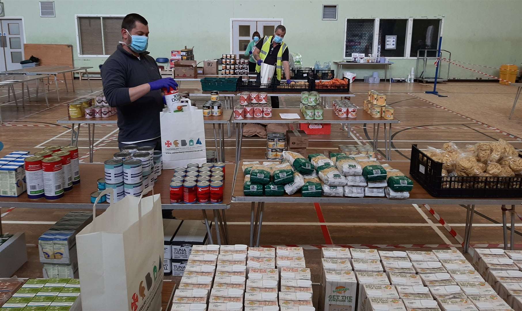 Volunteers sort through food. Picture: Canterbury City Council