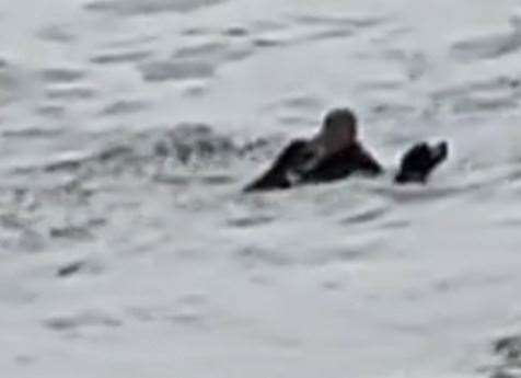 Jim Dixon with his dog Misty in the water off Ramsgate