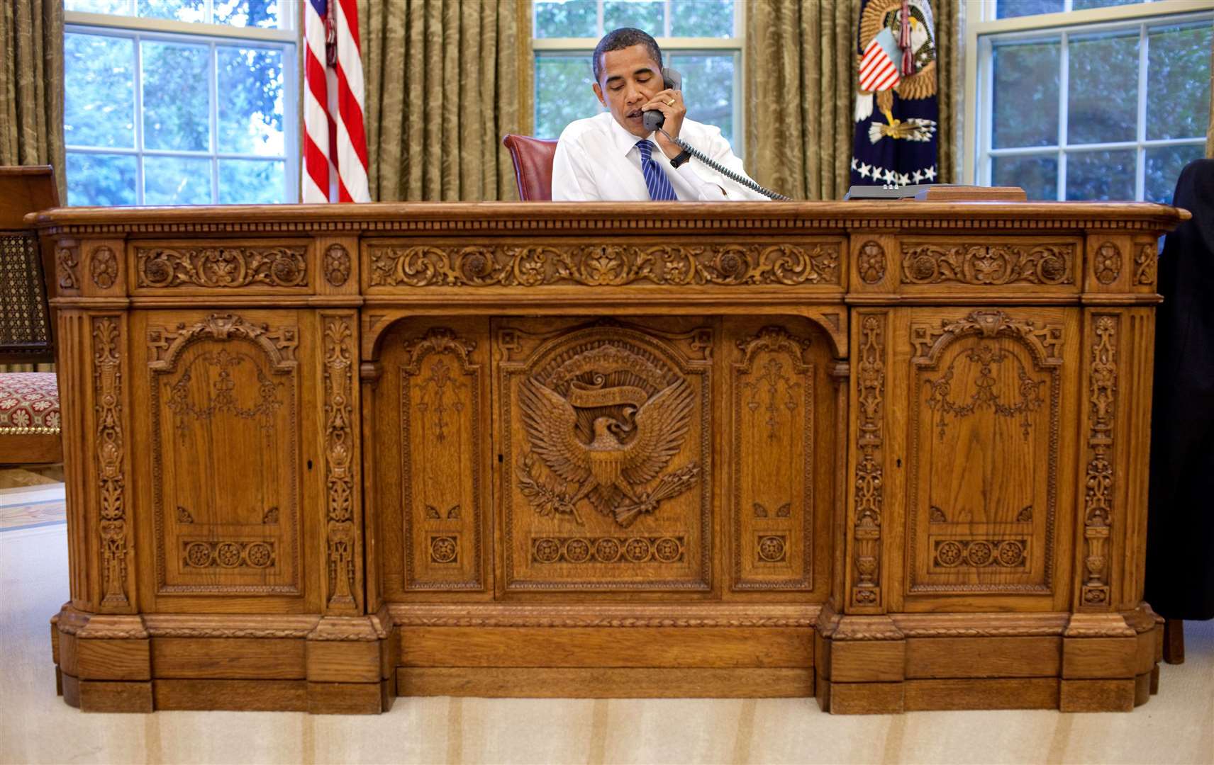 The desk was a favoured footstool for Barack Obama and at 590kg will make it a tough item to move should Mr Biden wish it to be changed. Picture: Official White House Photograph by Pete Souza