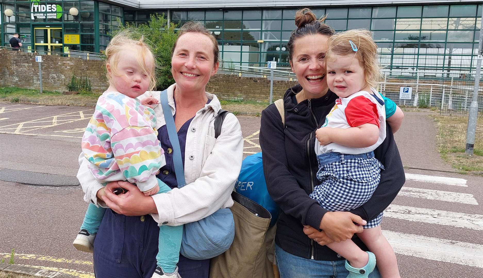 Jade Pooley with Ottie, two, and India Pearson-Clarke with Malou, two; Ms Pooley says Tides is "famous" for its pools