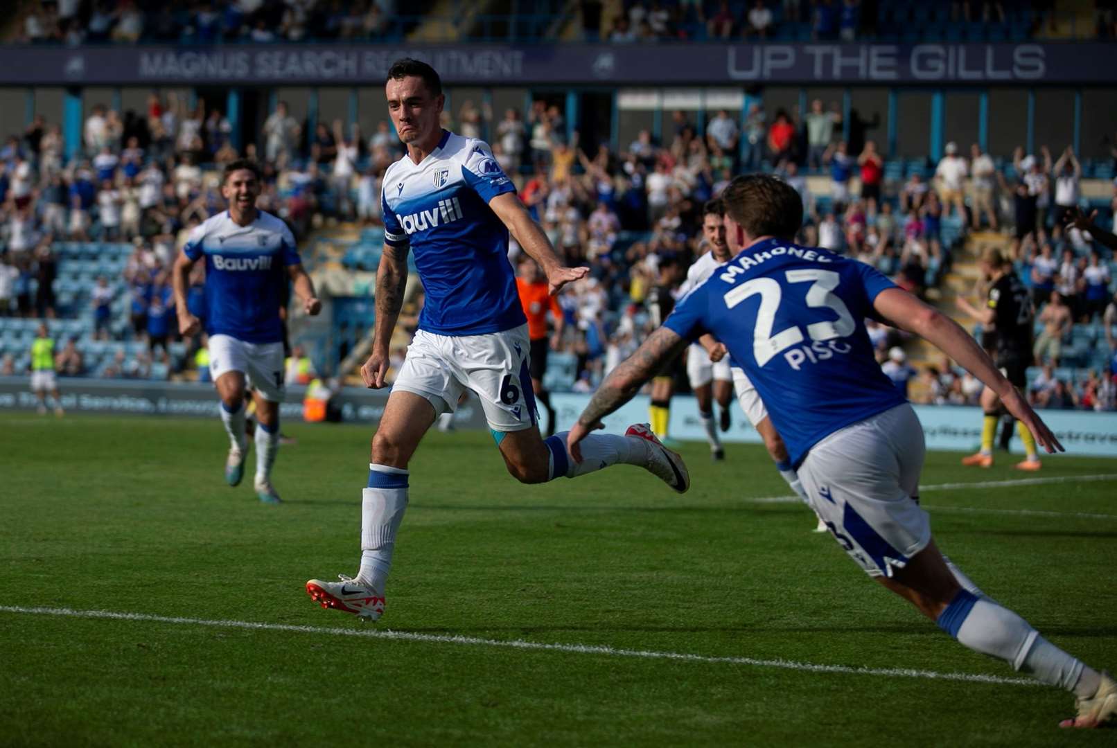 Shaun Williams celebrates his 95th-minute goal for Gillingham against Harrogate Picture: @Julian_KPI